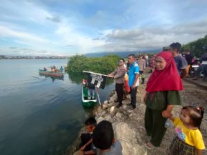 Kapolsek Pagimana Membuka Pelaksanaan Lomba Race Perahu Nelayan