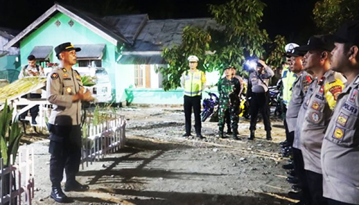 Polres Sigi bersama TNI, Laksanakan Pengamanan ‘Christmas Caroling’ di Desa Ampera, Kecamatan Palolo, Sigi