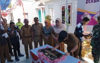 Satpol PP Bangkep, Melaksanakan Pengawalan Dalam Peresmian SIKM di Desa Lalong Kecamatan Tinangkung Utara