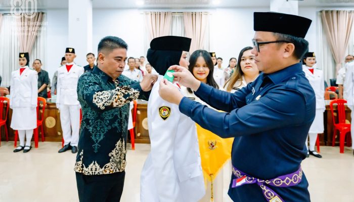 Bupati Delis Kukuhkan Paskibraka Morut Yang Akan Bertugas Pada Upacara HUT Kemerdekaan RI Ke-80