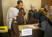Kawal Pemulihan Korban, Kejari Palu dan DP3A Sulteng Serahkan Uang Restitusi Rp77,4 Juta